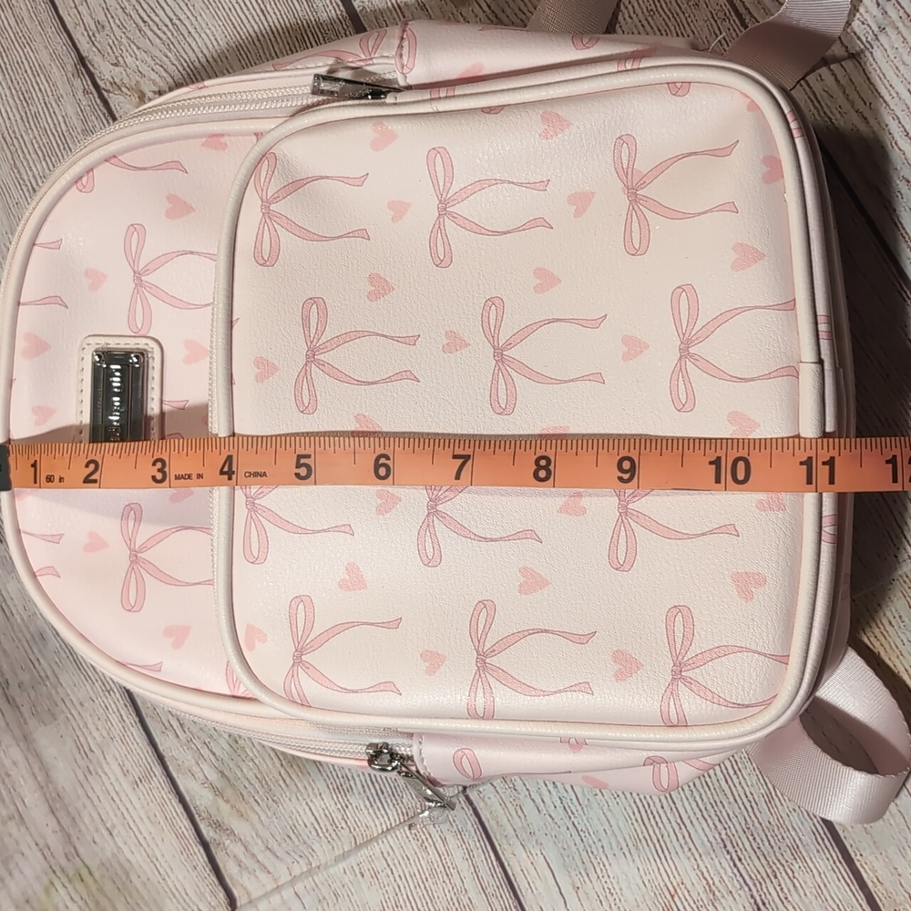 Madden Girl Pink With Bow Detail Mini Backpack & Matching Wristlet - Picture 6 of 16